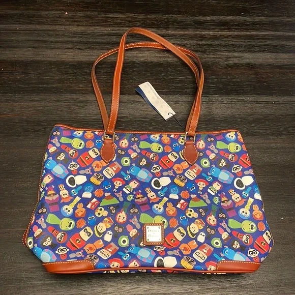 Disney Pixar Fest Shopper Tote by Dooney & Bourke.
